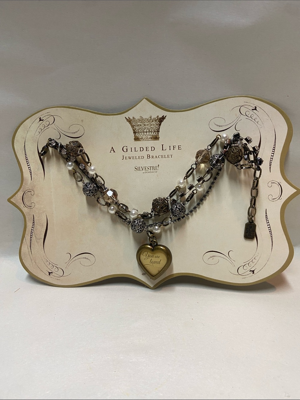 A Gilded Life Layered Mixed-Metal Heart Charm Bracelet in Gold and Silver NoC